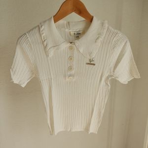 Brand New Eland white knitted top with embroidered flower